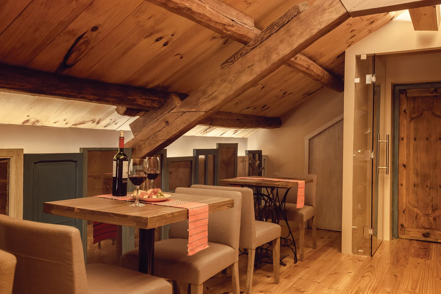 Attic dining area under exposed wood beams