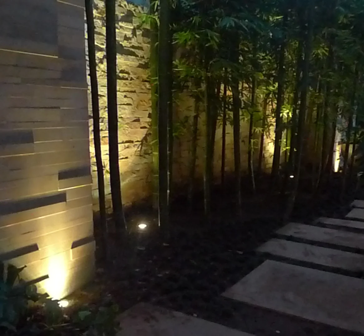 G Site — LED strips revealing the texture of wall stones