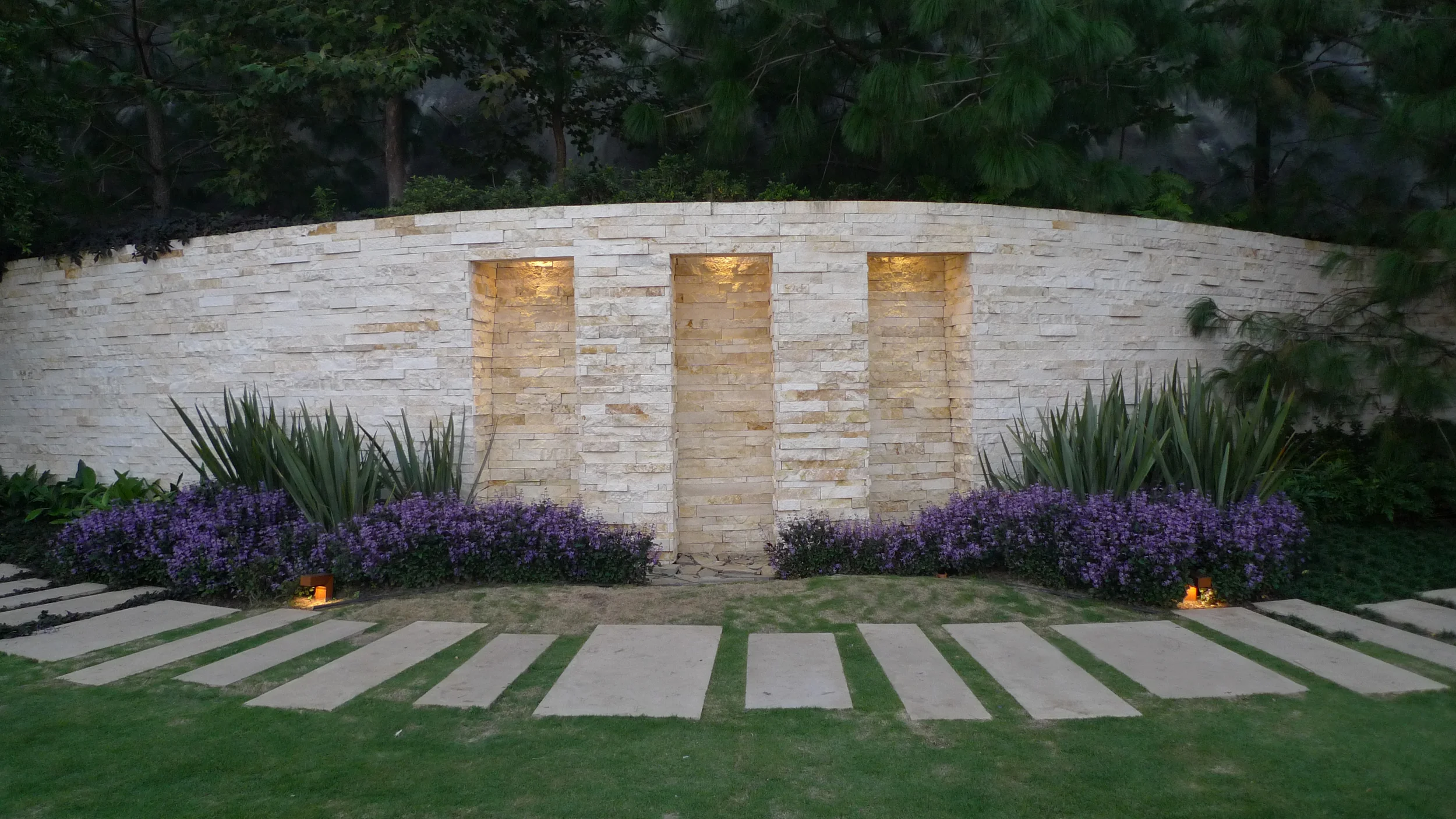 G Site — illuminated residential landscape against the darkness of the Monterrey mountains