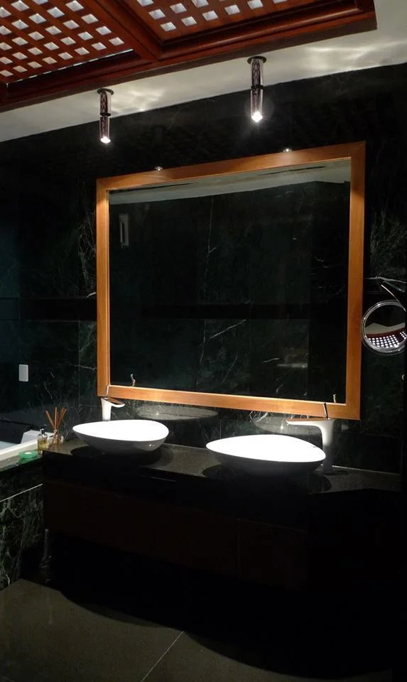 L Residence — bathroom lit to flatter stone and surface