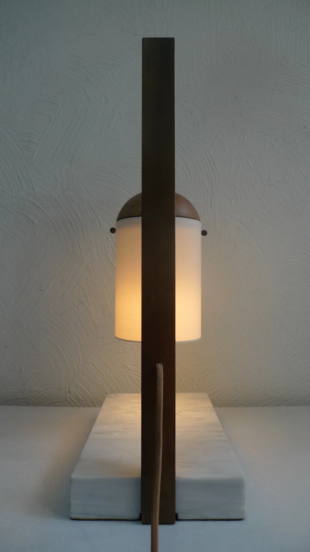 Lum — brass arm and turned-wood detail