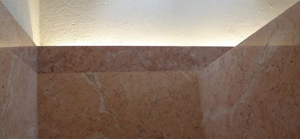 SESPEC — concealed cove lighting integrated into the architecture
